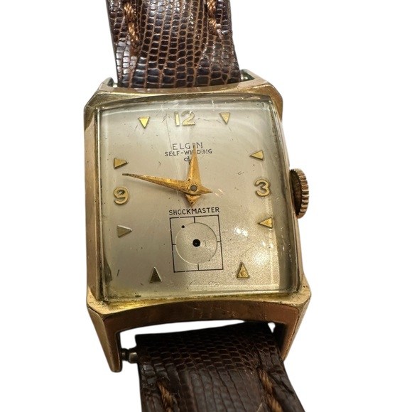 Vintage Elgin automatic Gold tone Watch with Brown Strap. Missing seconds hand
